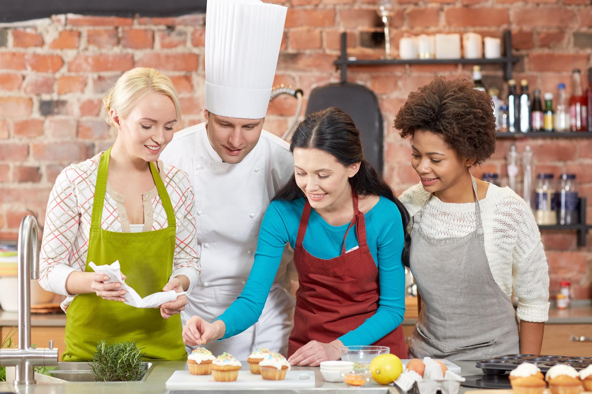 cook teaching a small class